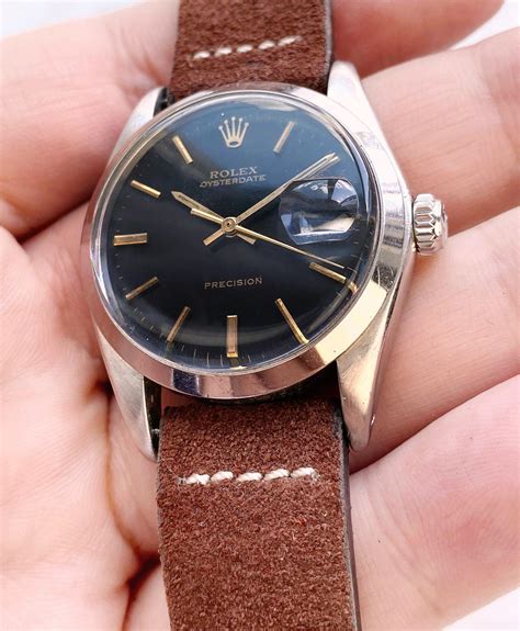 rolex black dial 1500 gilt